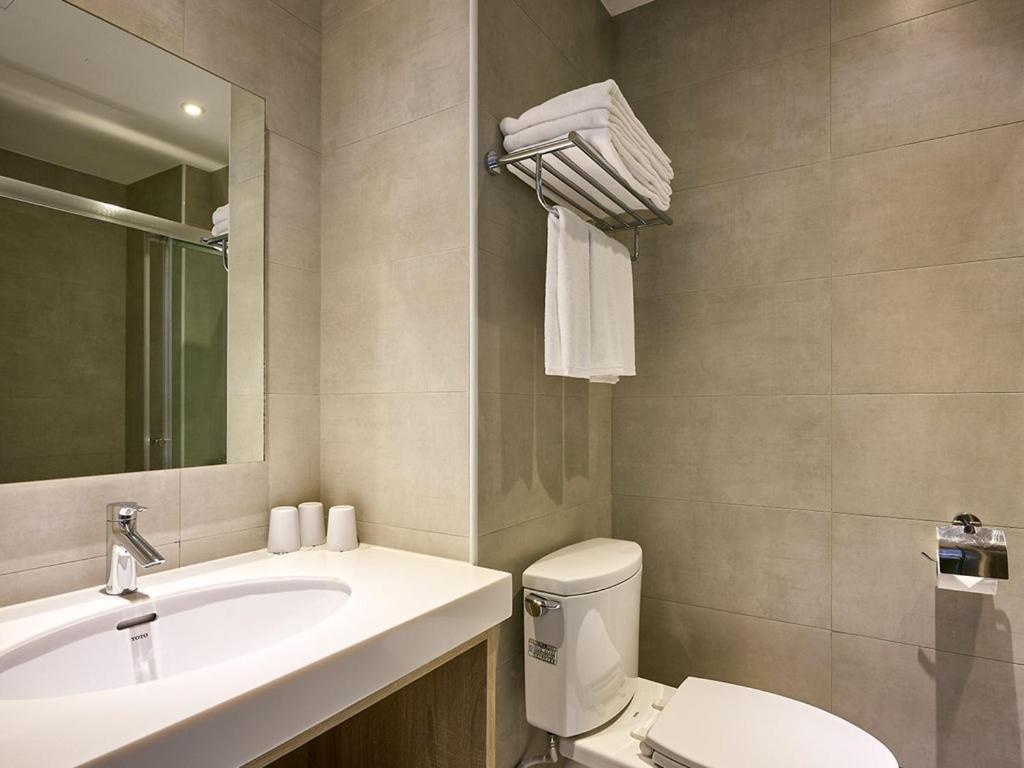 The Brick Hotel Taibao Bagian luar foto