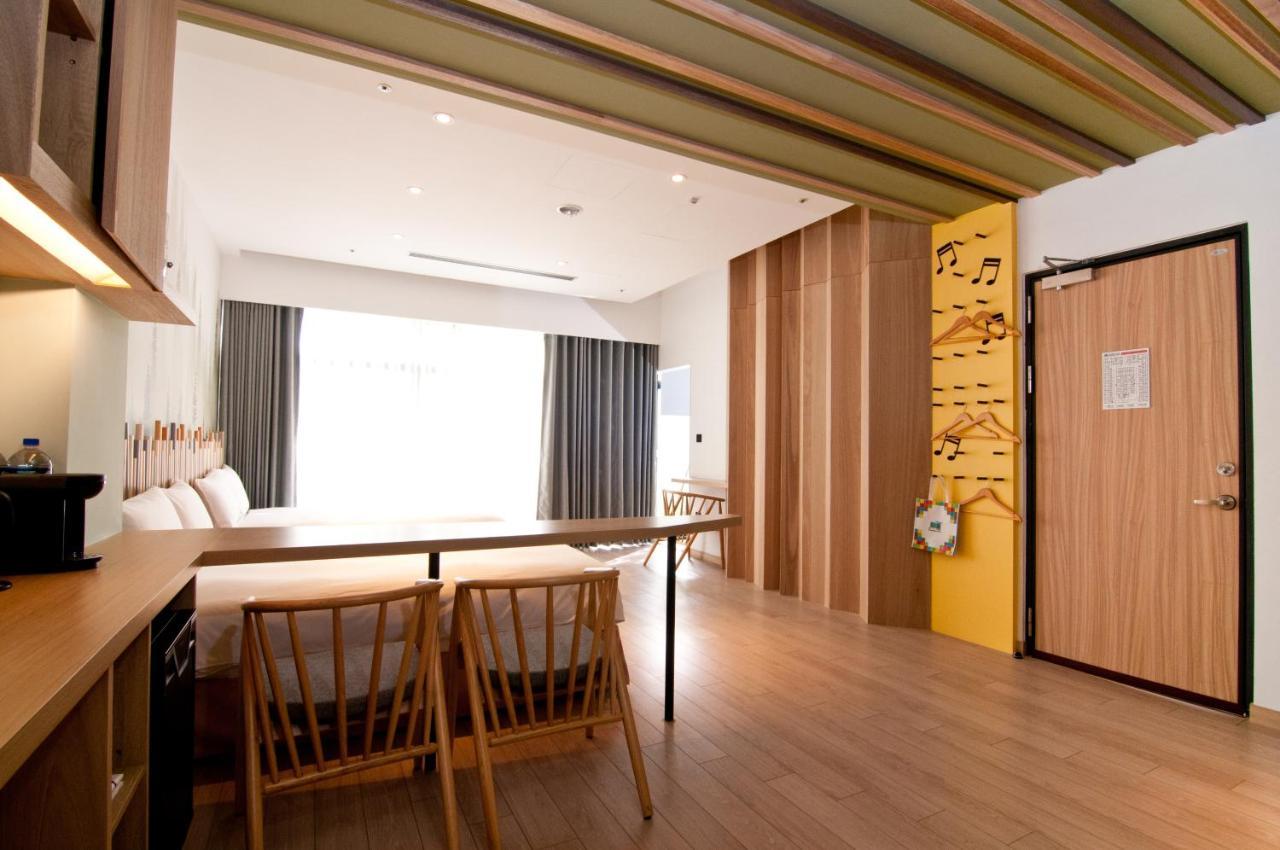 The Brick Hotel Taibao Bagian luar foto